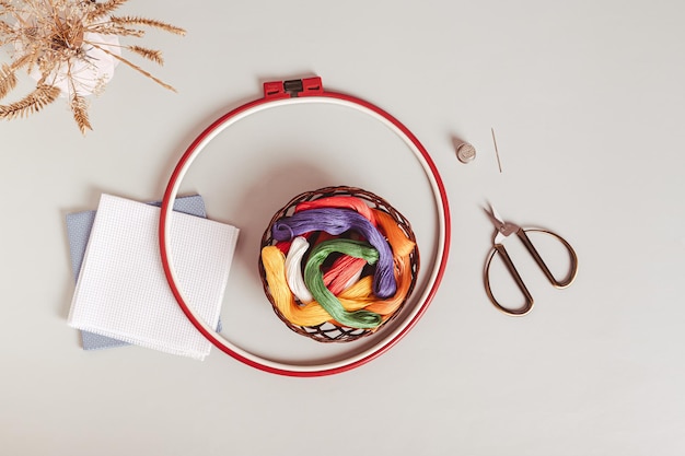 happy crafter holding embroidery